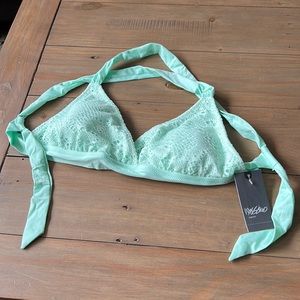 NWT. Mossimo sea green crochet bikini top. Cross-back with tie back.
